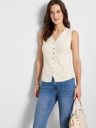Off-white ribbed sleeveless sweater vest with a V-neck and button front.