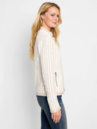 Off-white knit jacket with thin taupe pinstripes and trim.  Side zipper.
