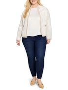 Off-white knit jacket with thin brown pinstripes, notch collar, and brown trim.  Zip front.