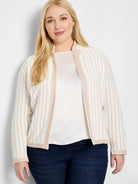 Off-white knit jacket with thin brown pinstripes and coordinating trim. Notch collar, long sleeves.