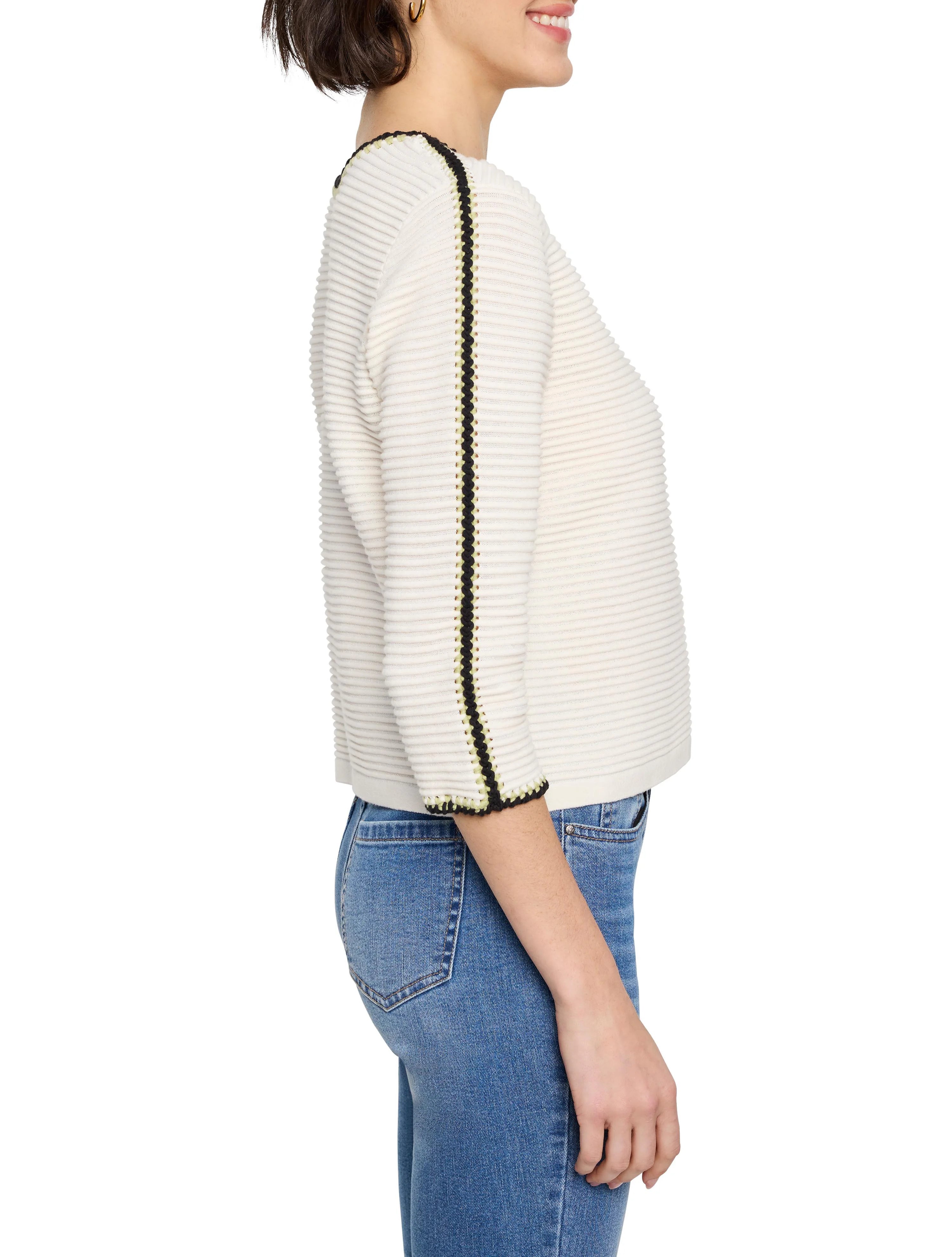 Off-white ribbed sweater with black and pale yellow trim along neckline and sleeves. Three-quarter sleeves.