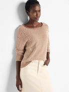 Brown and cream striped cotton sweater.  Seamed detail at shoulders.  Loose fit.