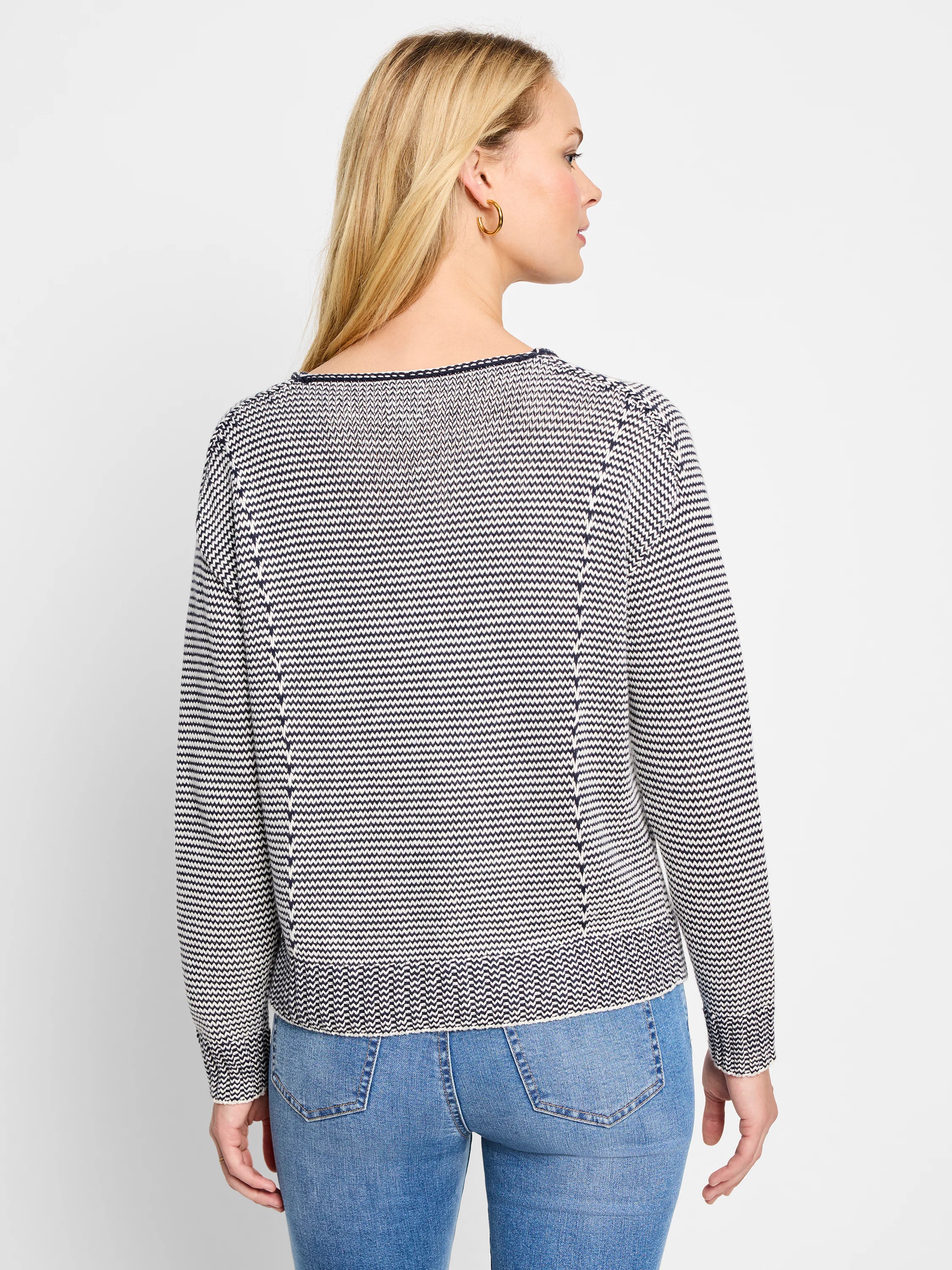 Cream and navy striped cotton sweater.  Seams at shoulders and sides. Long sleeves, ribbed cuffs and hem.