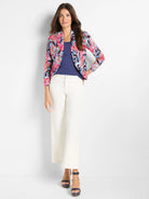 Pink, blue, and black abstract floral print bolero cardigan; three-quarter sleeves.