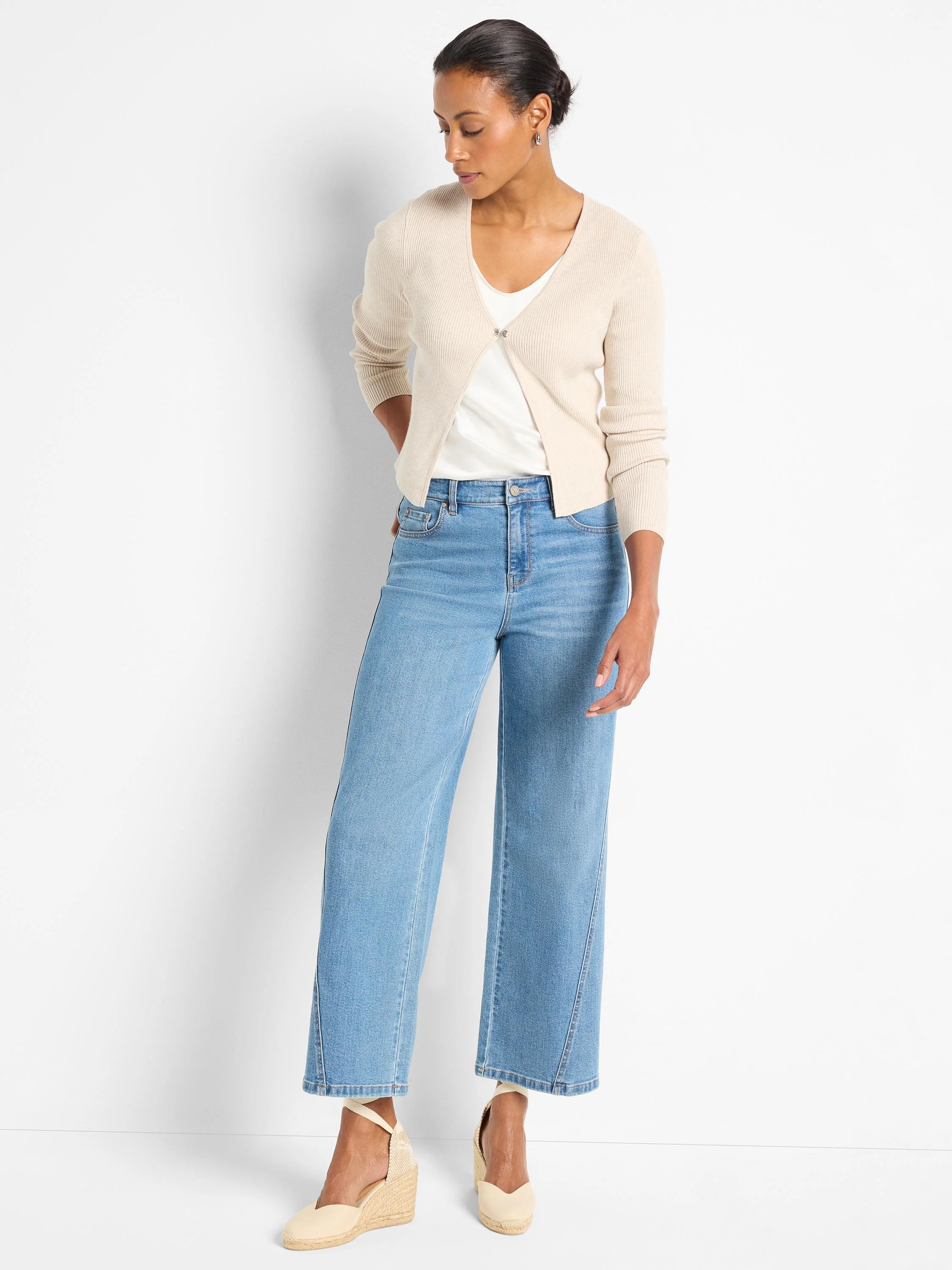 Light beige ribbed knit cardigan with long sleeves and a single silver-toned front clasp.