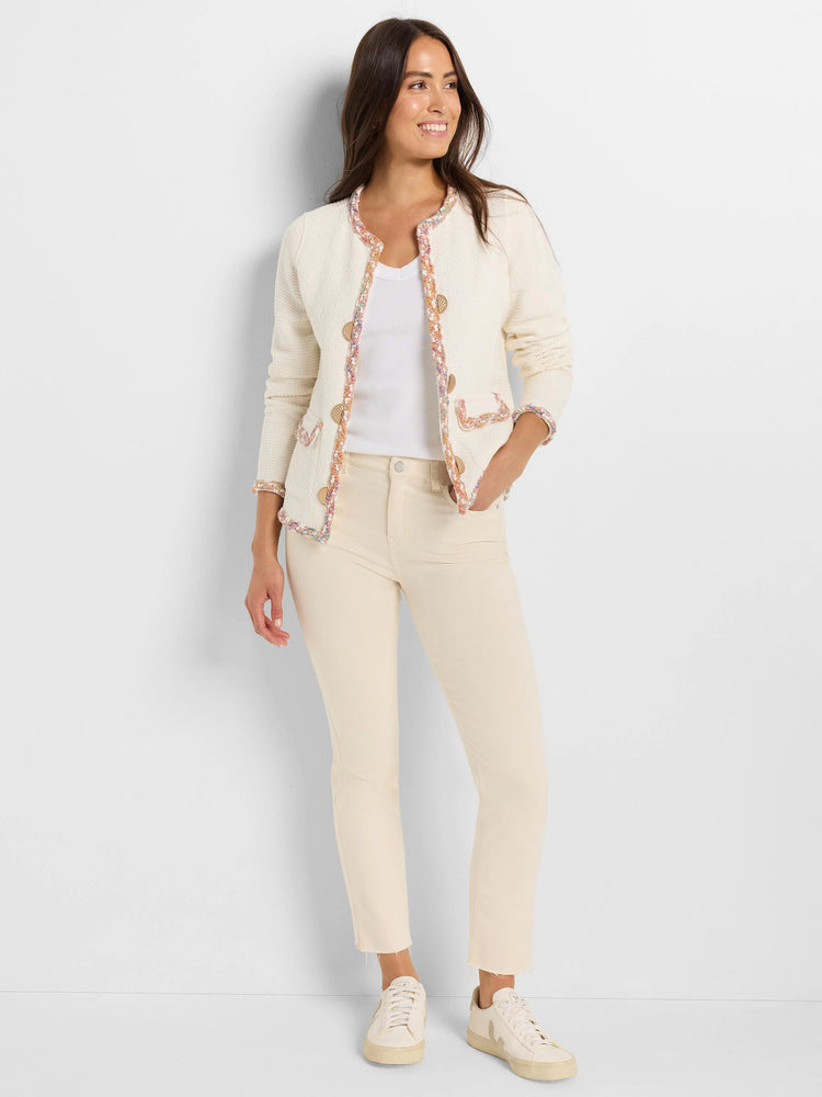 Off-white knit jacket with multicolored trim, featuring buttons and pockets.