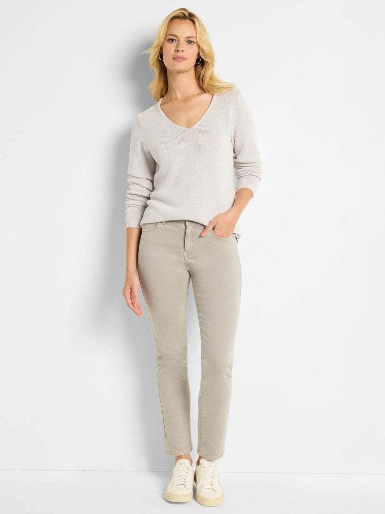 Light beige V-neck sweater with a textured cord knit and long sleeves.