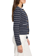 Navy & white knit sweater jacket with a windowpane grid, gold buttons, and white trim.