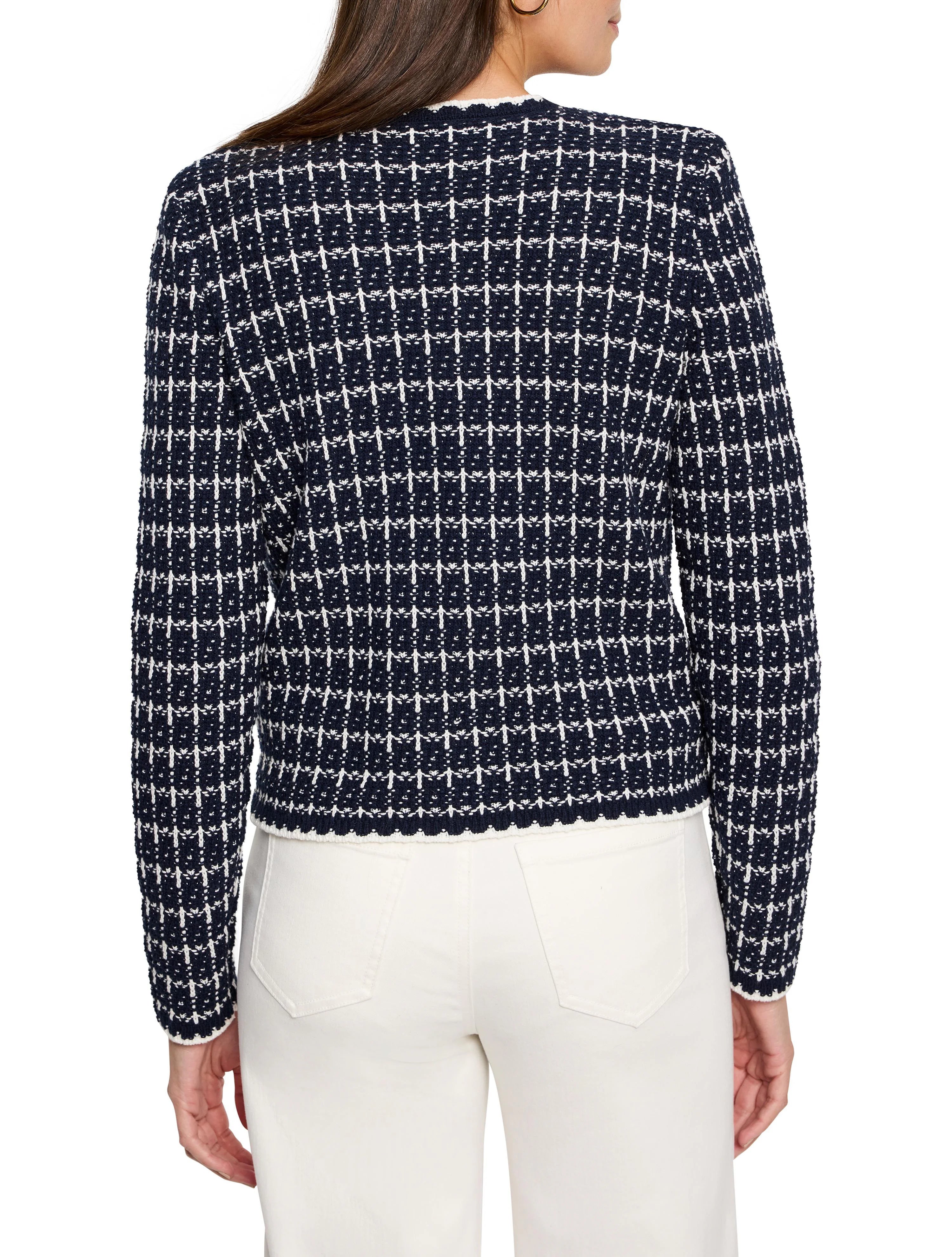 Navy and white tweed-knit sweater jacket with a grid pattern and white scalloped trim. Back view.