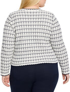 Off-white sweater jacket with navy textured grid pattern, ribbed dark blue collar, cuffs, and hem. Back view.