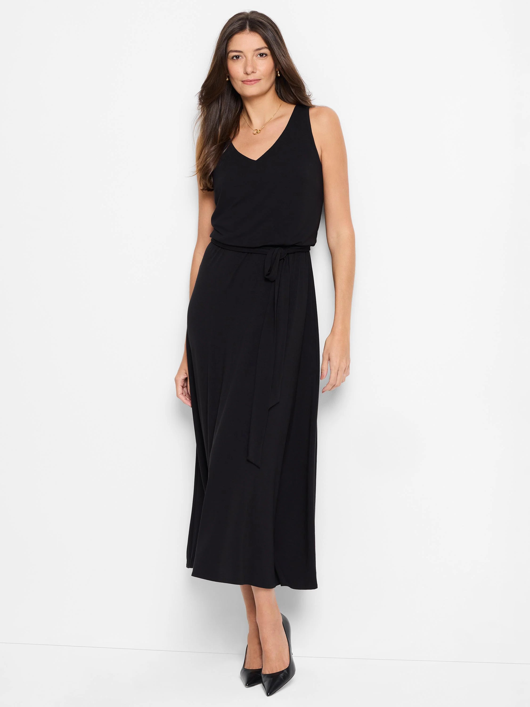 Black midi dress, V-neck, sleeveless, belted waist.