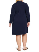 Navy blue, long-sleeved knit dress, A-line silhouette.  Back view shows a center pleat detail.