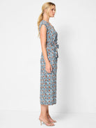 Midi dress, blue, brown, and white geometric print.  V-neck, short sleeves, belted waist.