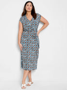 Blue and brown patterned midi dress; V-neck, short sleeves, wrap style with self-tie belt.