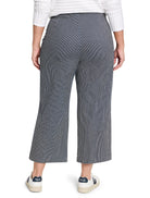 Navy and white pinstripe wide-leg jeans, cropped above the ankle, shown from the back.