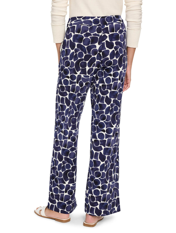 Wide-leg pants; off-white background with navy blue, abstract pebble print.