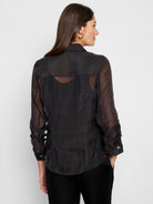 Black, semi-sheer, long-sleeve button-up jacket.  Slightly wrinkled texture.  Back view shown.