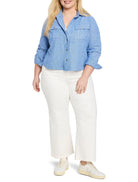 Light blue linen shirt jacket, button front, two chest pockets.  Long sleeves.