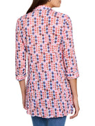Crinkle shirt with pink, red, brown, and blue abstract print.  Three-quarter sleeves, collared.  A-line shape.