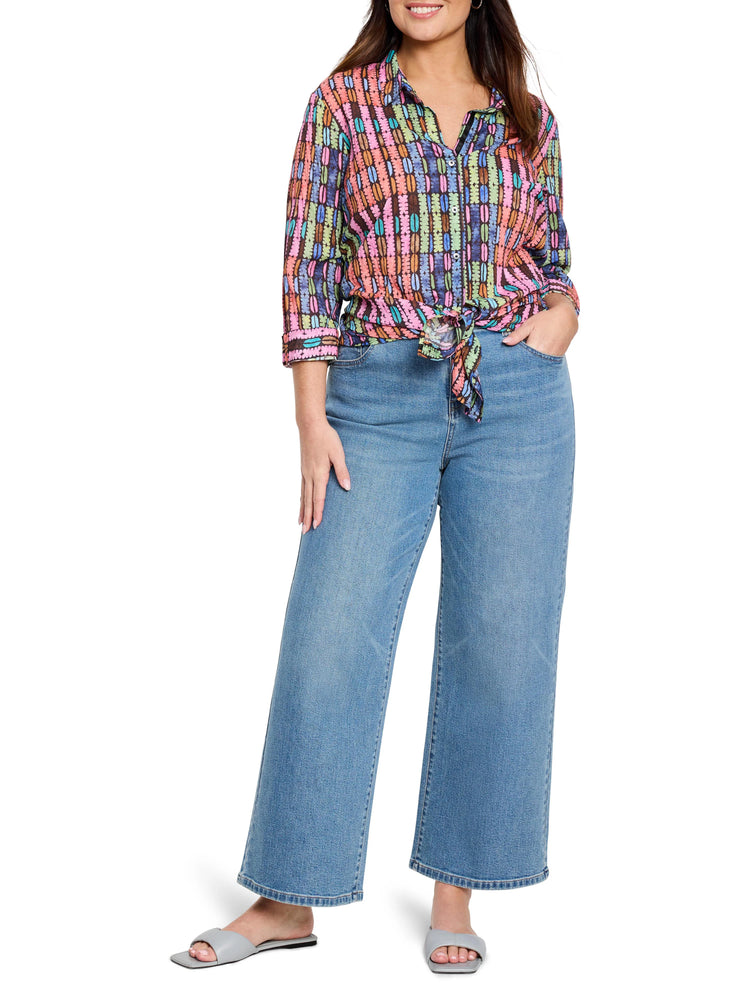 Rainbow macaroon-print button-down shirt;  pink, orange, green, blue, brown vertical stripes on dark background. 3/4...