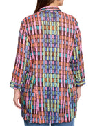 Long-sleeve collared shirt with vertical stripes of pink, orange, brown, teal, and blue abstract shapes on a dark...
