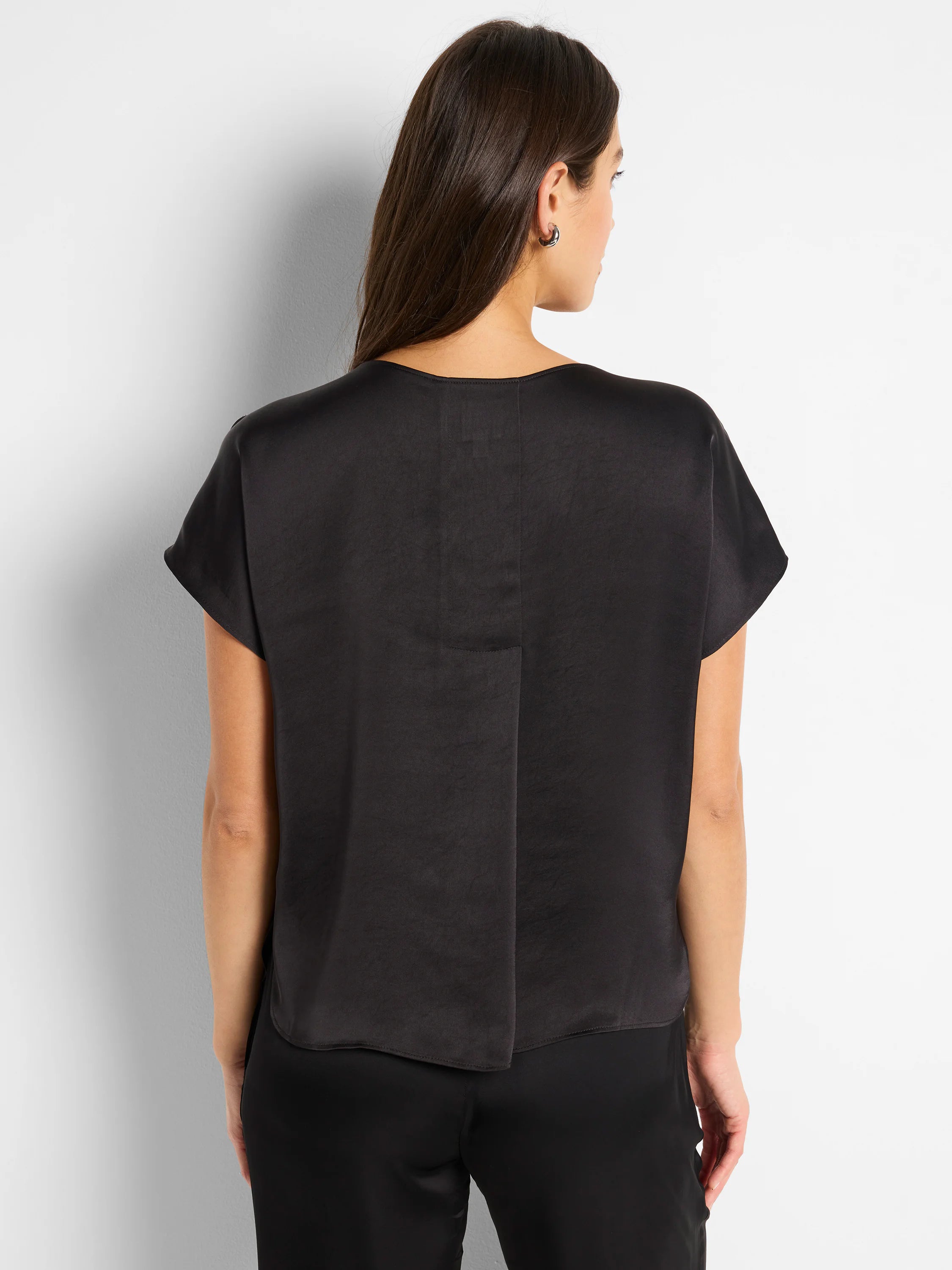 Dark charcoal glossy woven tee with a relaxed fit, short sleeves, and a center back pleat.