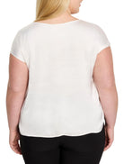 Light cream woven tee, back view. Features short, loose sleeves, a relaxed fit, and subtle sheen.