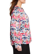 Pink, teal, and mauve floral print woven top with long sleeves and a relaxed fit.