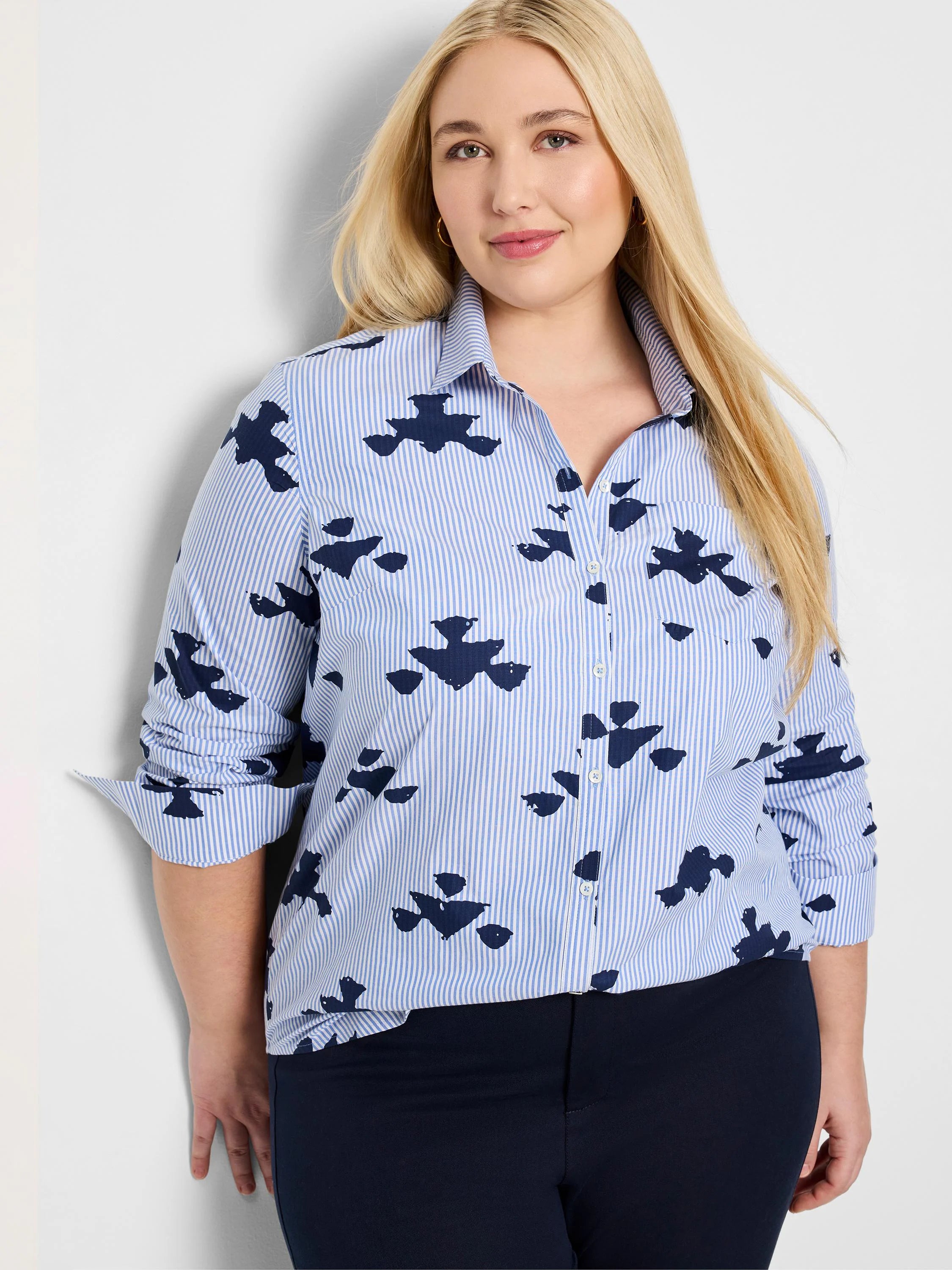 Blue & navy shirt; thin blue stripes, dark navy stamped abstract shapes.  Long sleeves, button front.