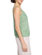 Green sleeveless tank top with a swirling, speckled white and black pattern.