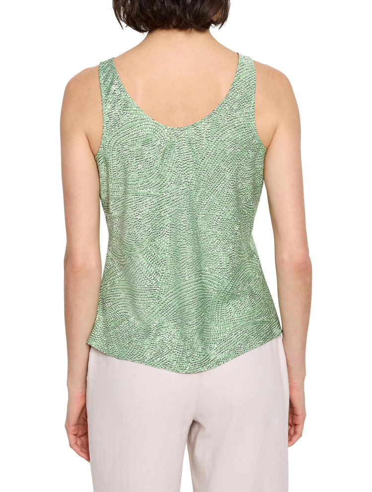 Back view of light green sleeveless top.  Swirling, speckled pattern in black and white.
