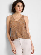 Brown sleeveless tank top with a V-neck and a white dotted pattern.