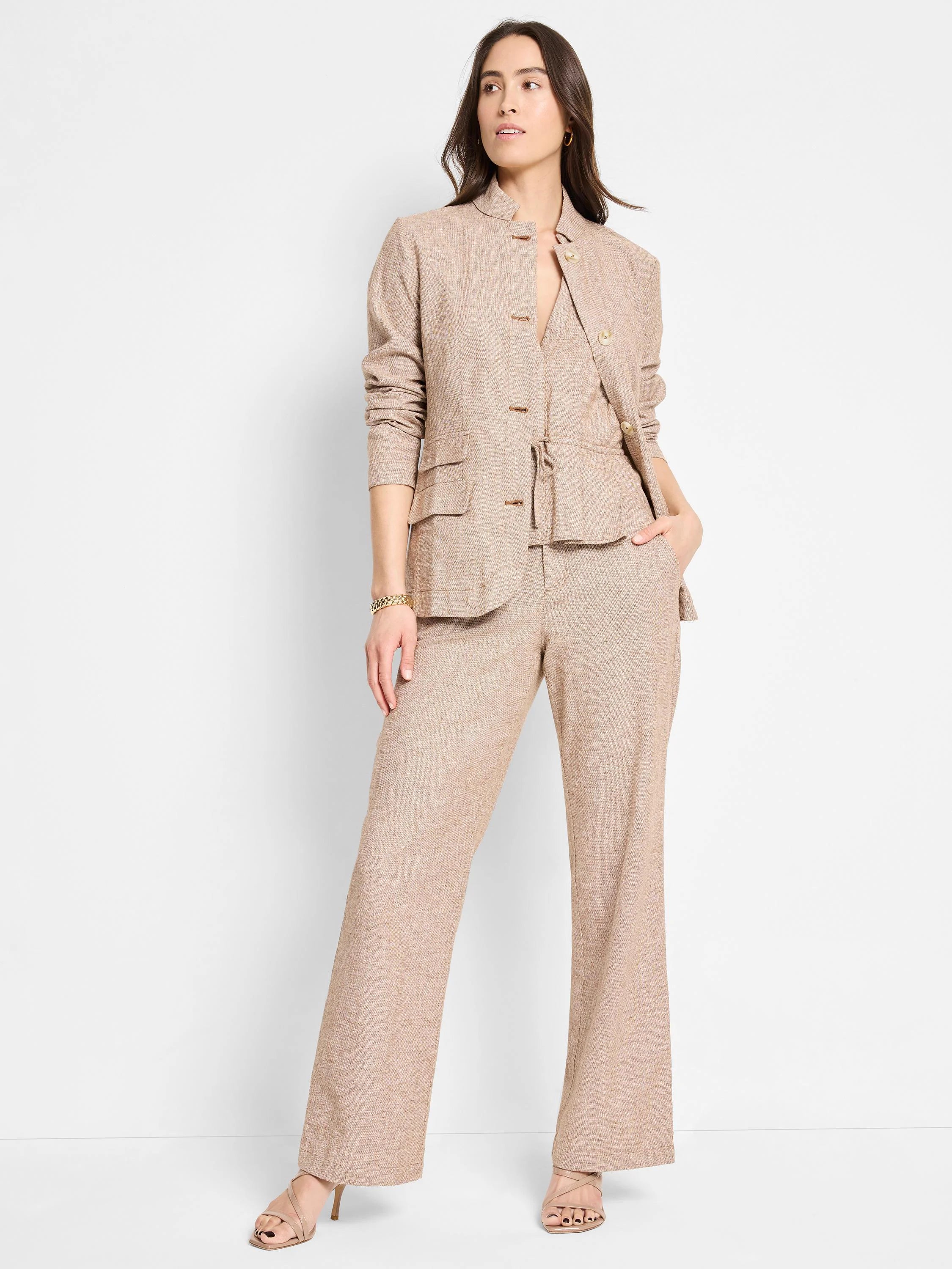 Beige linen-cotton vest; mandarin collar, front buttons, and pockets.