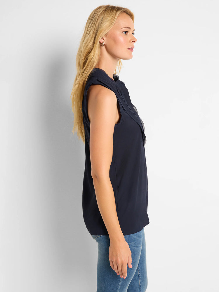 Navy blue sleeveless woven tank top with ruffled neckline.