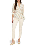 Off-white wrap top with diagonal stripes in peach, green, and beige.  Long sleeves, tied waist.