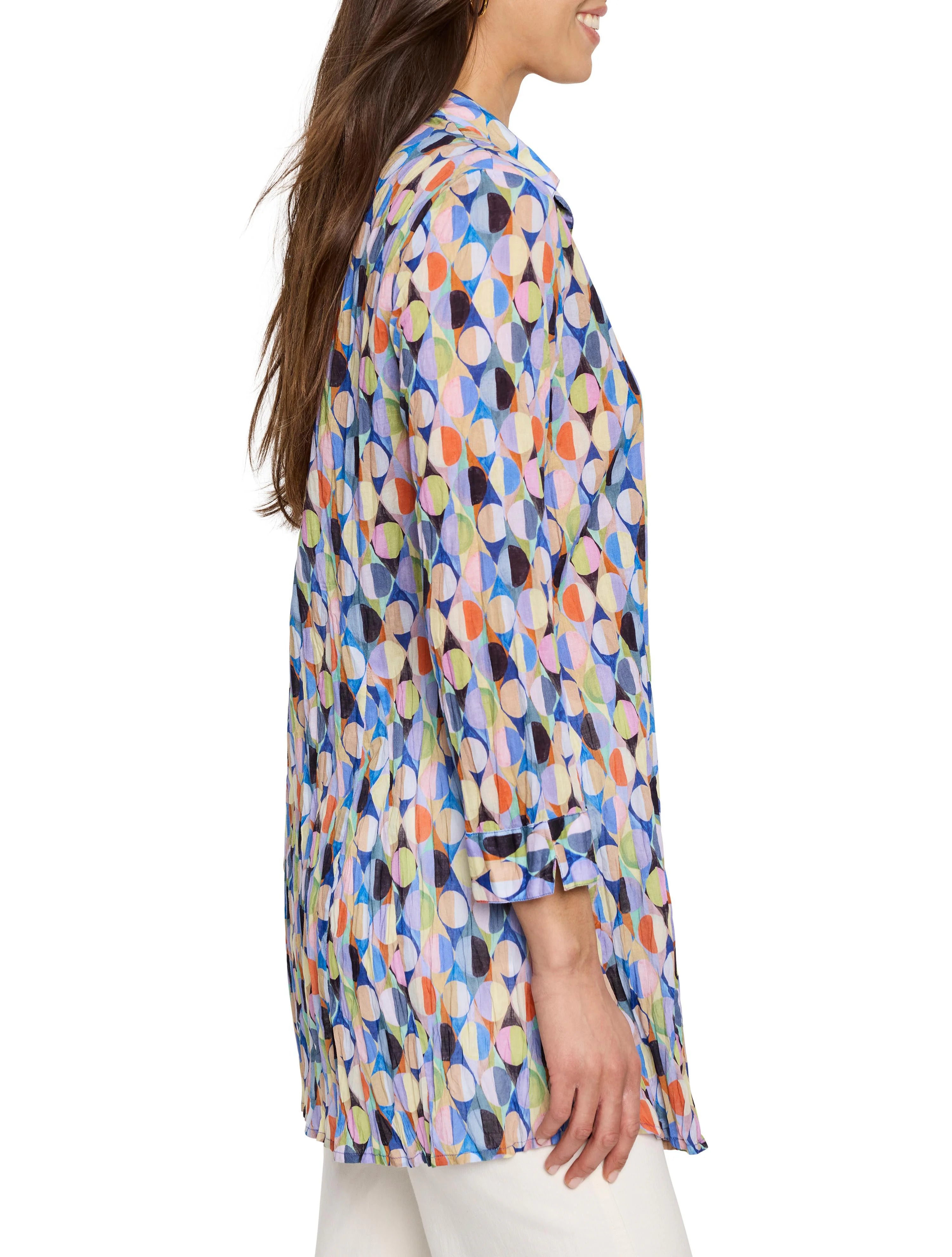 Crinkled, 3/4 sleeve shirt.  Multicolored geometric pattern with blues, oranges, pinks, and greens.  Collared.