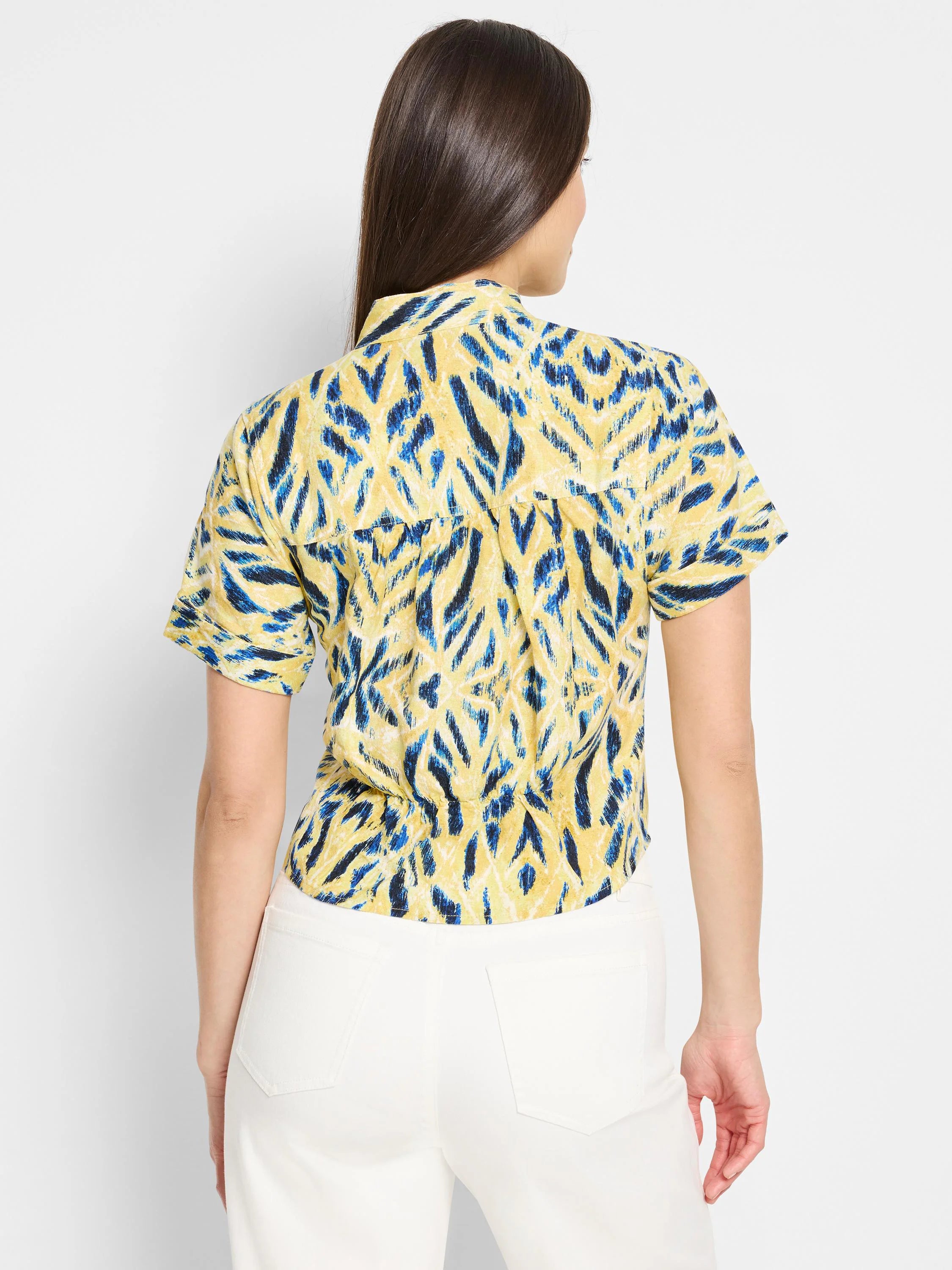 Yellow shirt with blue & white woven pattern. Short sleeves, tie waist.