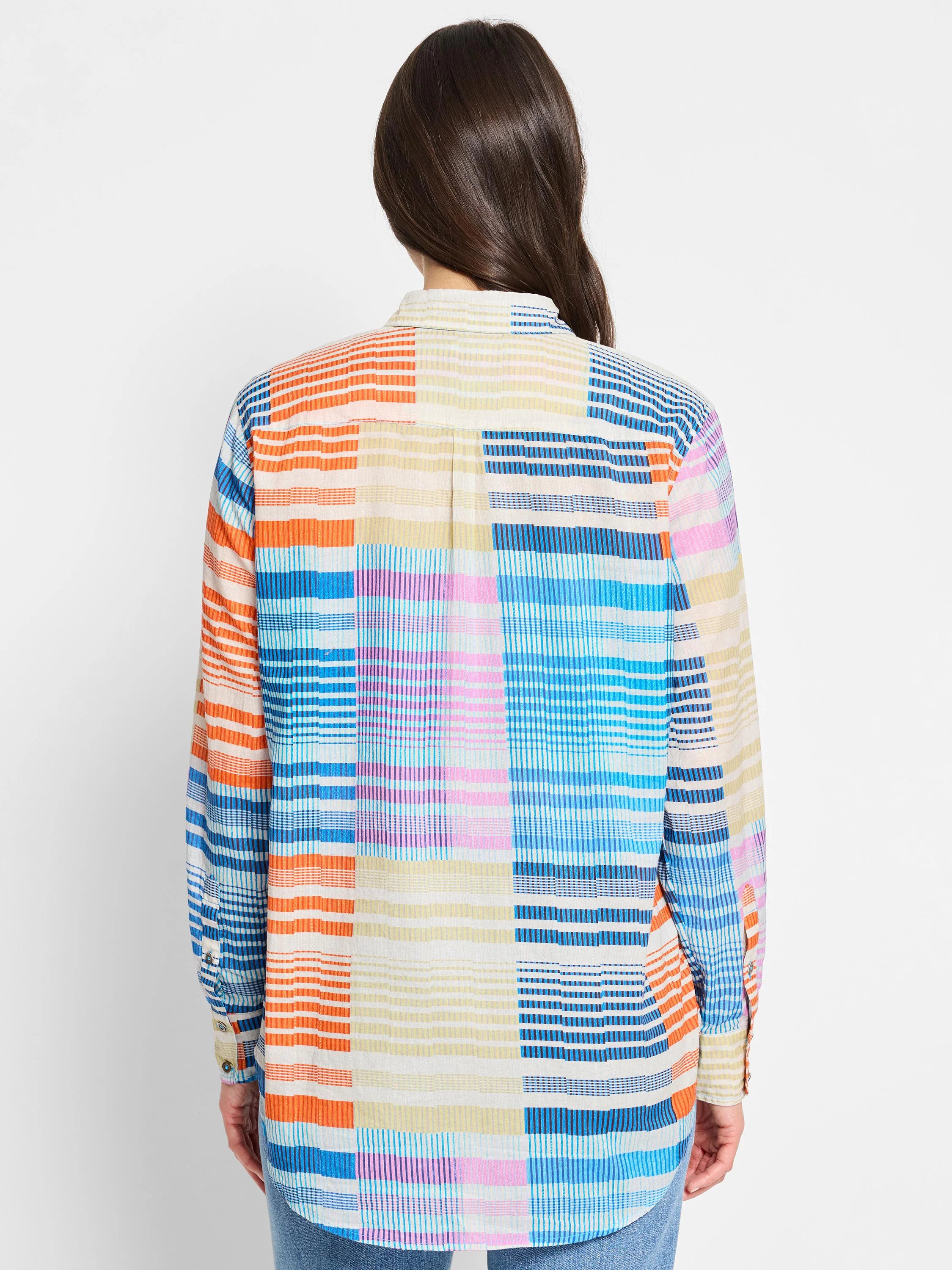 Cotton shirt, multicolored stripes and blocks of blue, orange, pink, and beige on an off-white background.  Long sleeves,...