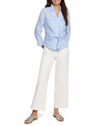 Light blue, tie-front shirt;  three-quarter sleeves, collared.