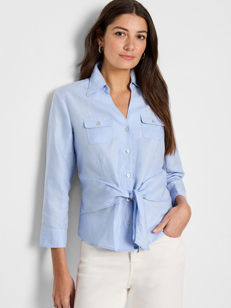 Light blue, tie-front shirt; three-quarter sleeves, collared, two chest pockets, button front.