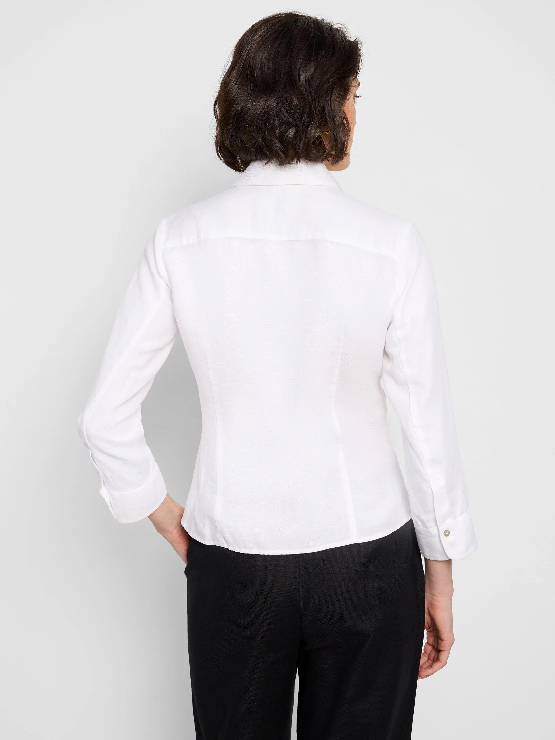 White, long-sleeve collared shirt; tie-front detail; shown from the back.
