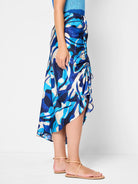 Blue, teal, and beige abstract print midi skirt; asymmetrical hem; drawstring side detail.