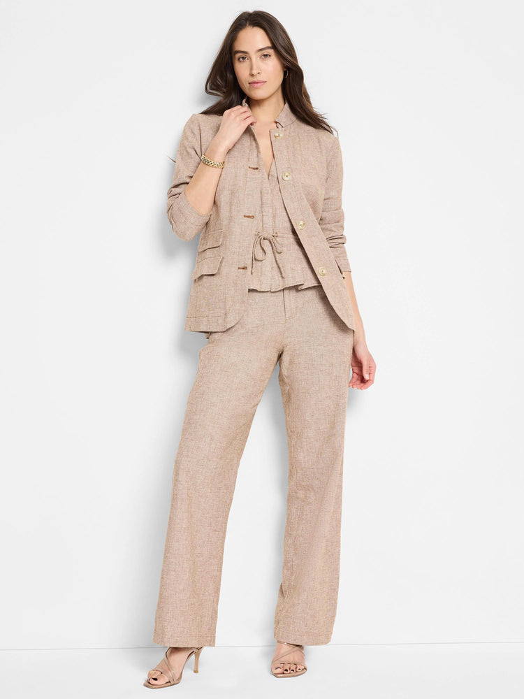 Beige linen-cotton wide-leg pants; textured fabric.