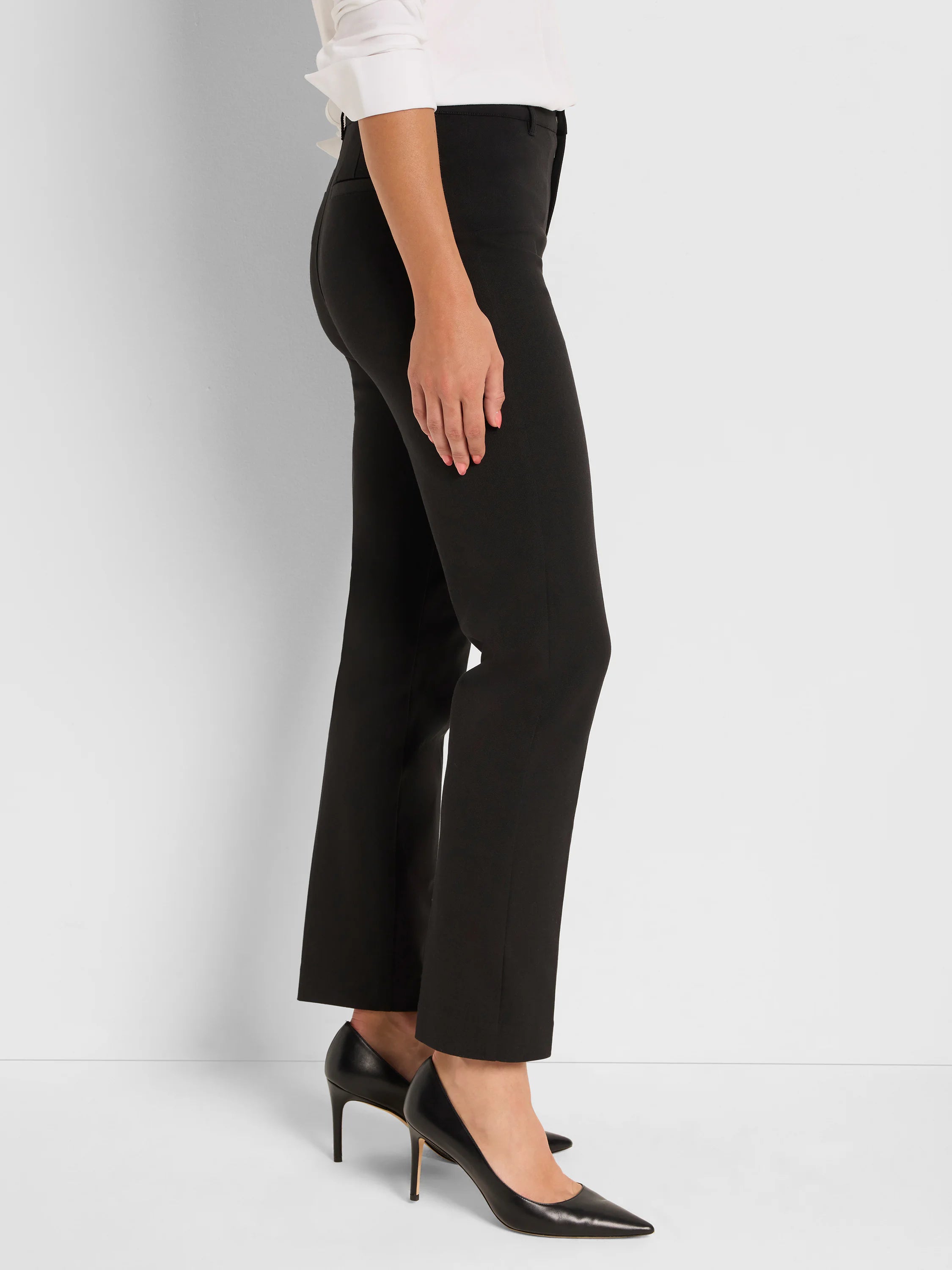 Black straight-leg pants, fitted through the hips, falling straight to the ankle.