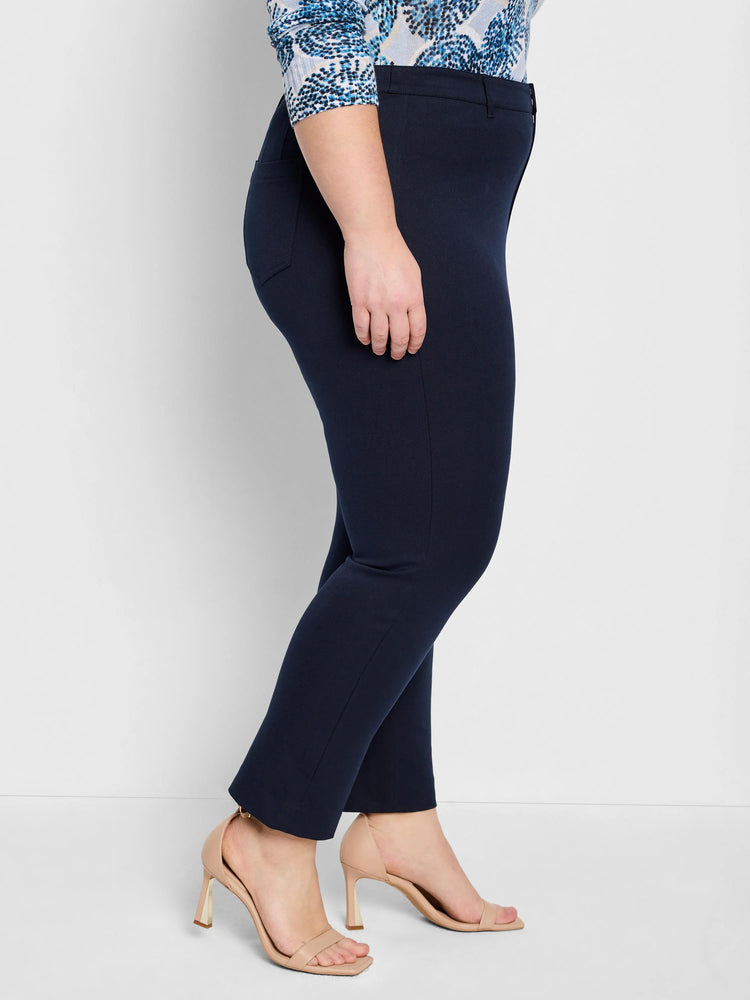Dark navy bi-stretch straight pants on a person. Smooth fabric, ankle length.