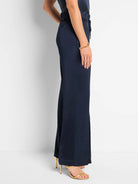 Dark navy blue wide-leg pants with front slits and an elastic waistband.