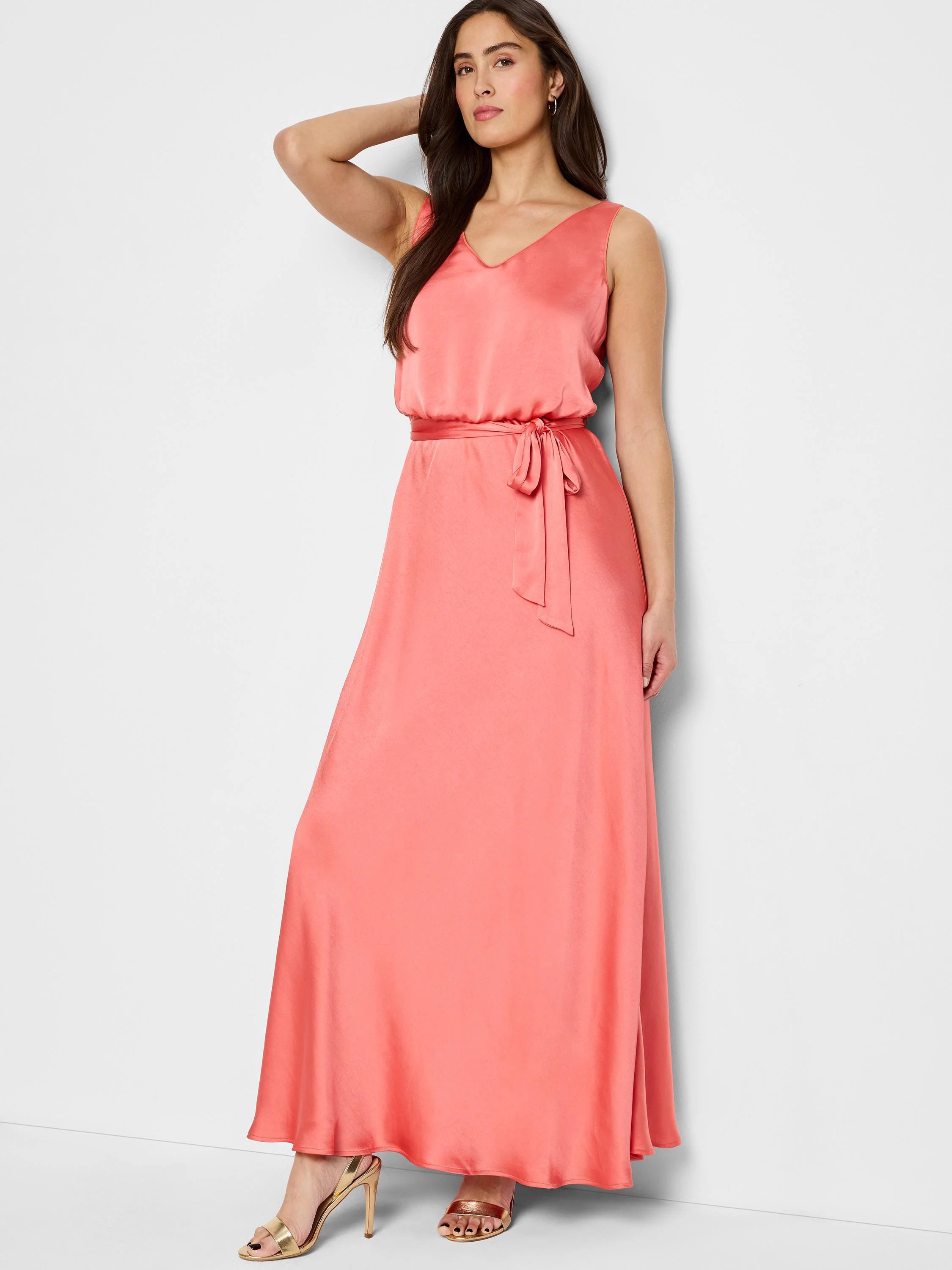 Coral pink maxi dress, sleeveless, V-neck, belted waist.