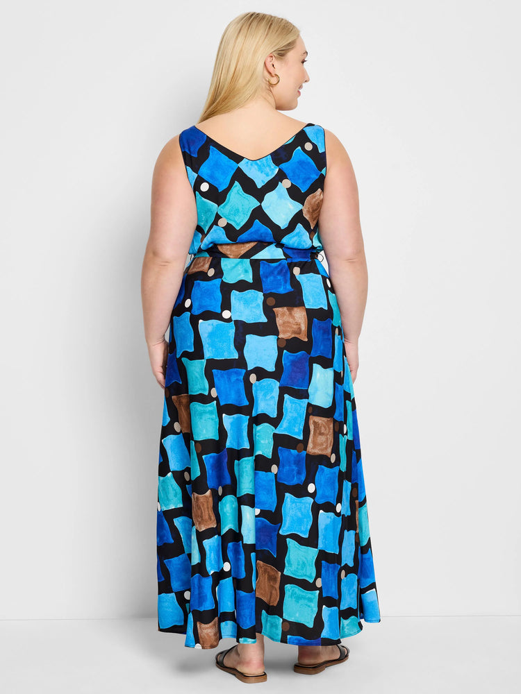 Black sleeveless maxi dress with an abstract print in blues, teals, and browns.  V-neck.