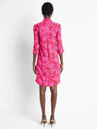 Pink midi shirt dress.  Red & blue abstract print. Three-quarter sleeves.  A-line silhouette.