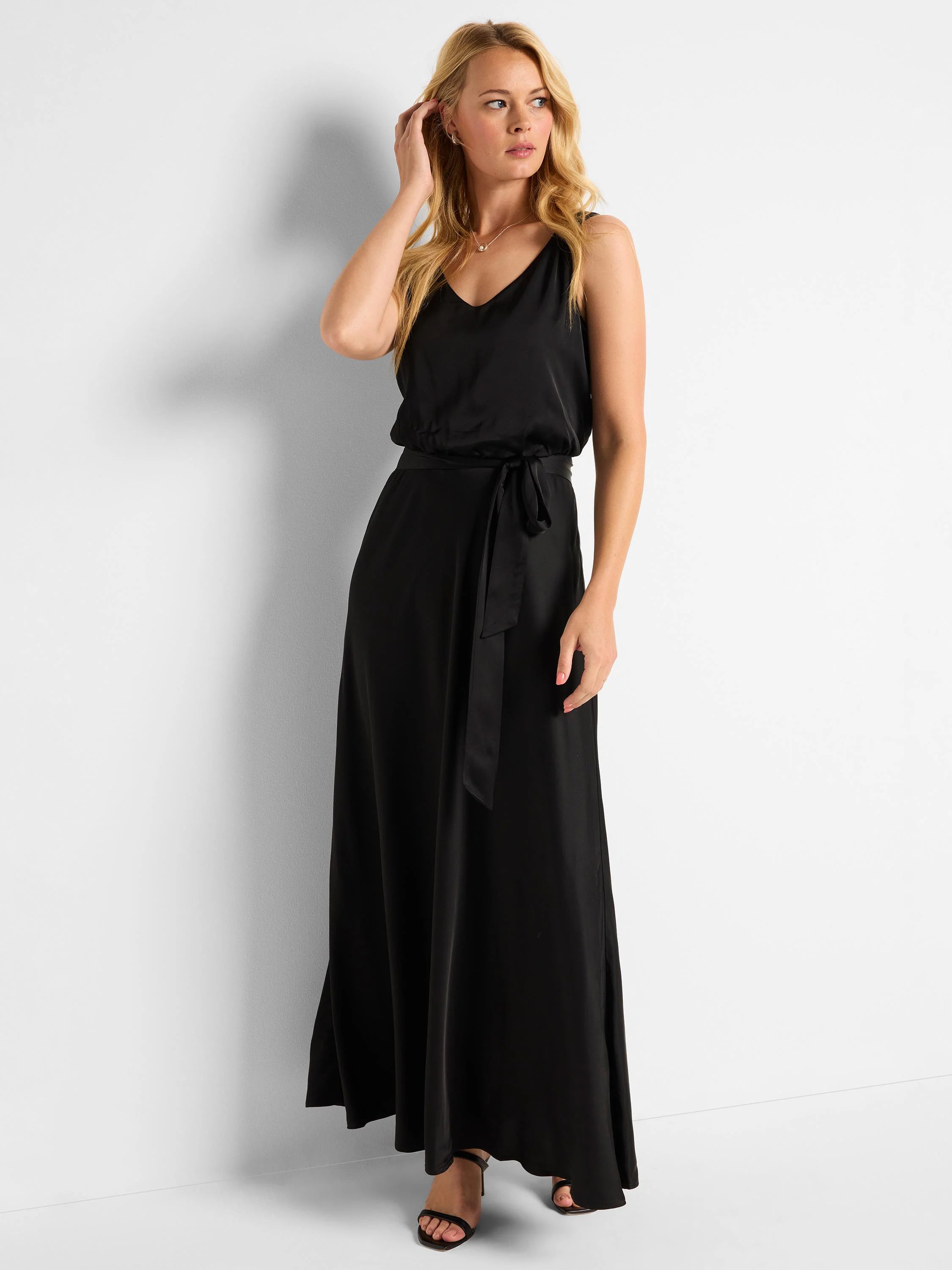 Black maxi dress, V-neck, sleeveless,  empire waist with self-tie belt.